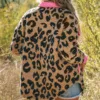 Women in leopard shacket back view