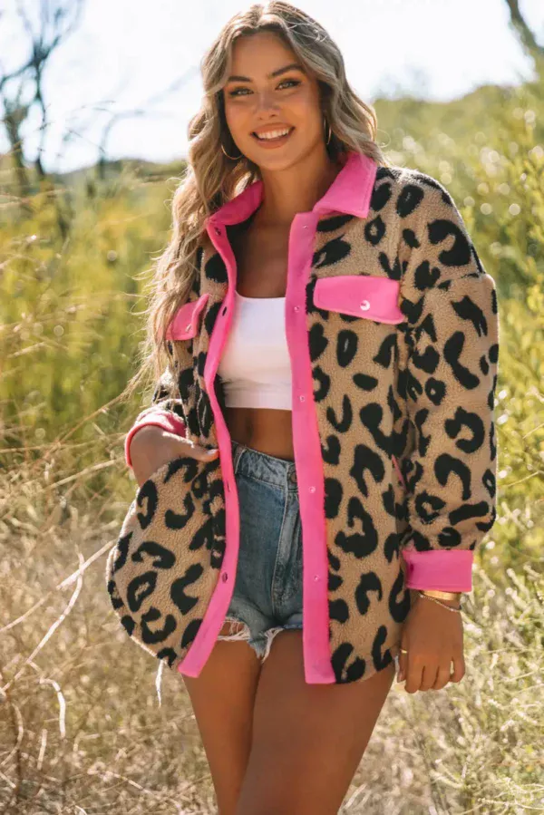 Women in a leopard contrast teddy shacket with pockets
