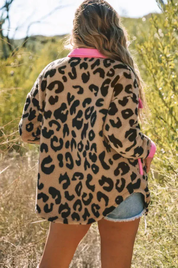 Women in leopard shacket back view