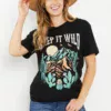 Women in a keep it wild graphic tee