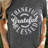 Women in Thankful,Grateful,Blessed graphic tee close up